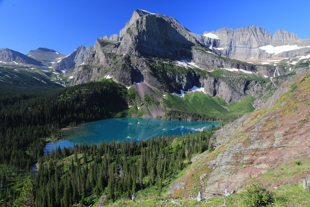 a lake surrounded by mountains