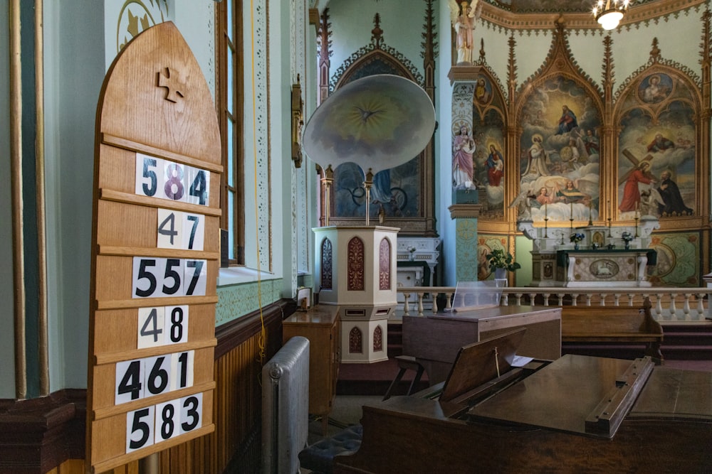 a room with a large clock and a large mirror