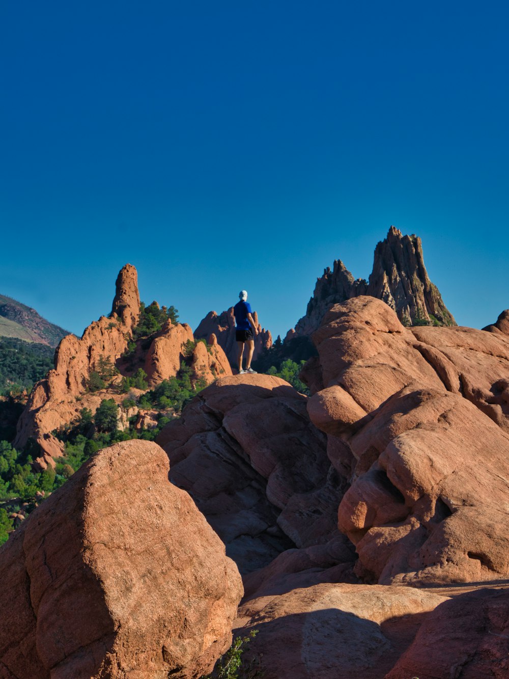 a person standing on a rock