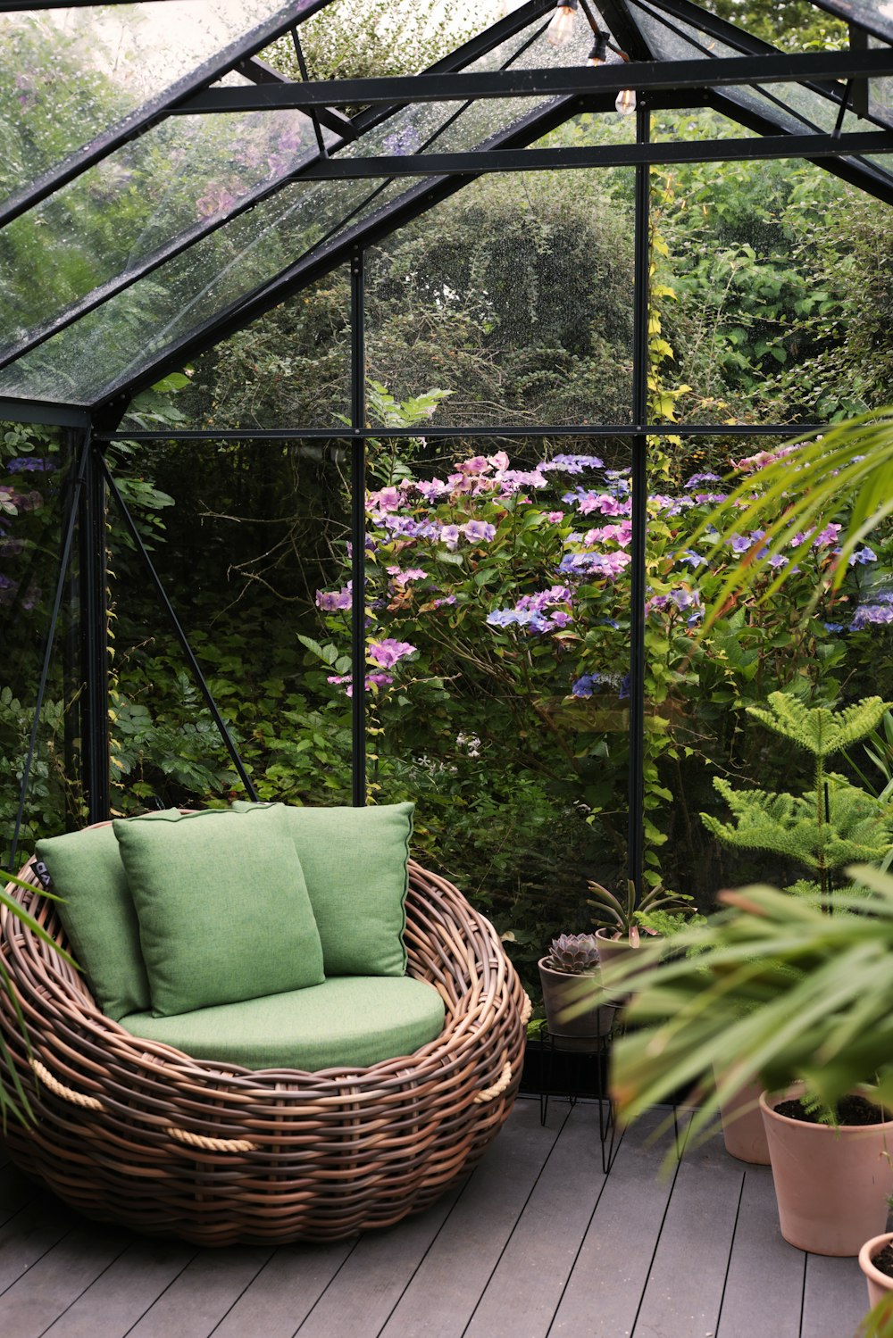a green couch on a deck