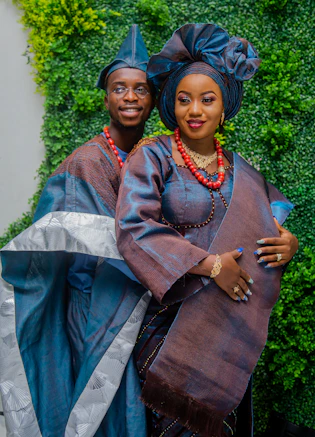 a man and woman wearing clothing