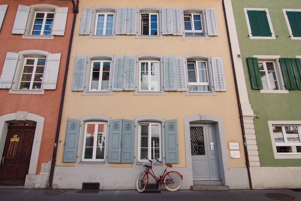 a bicycle parked in front of a building