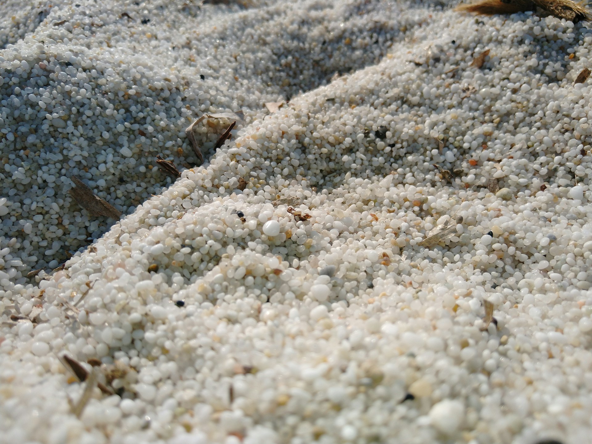 woman wearing yellow long-sleeved dress under white clouds and blue sky during daytime