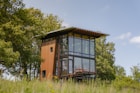 a house with trees in the background