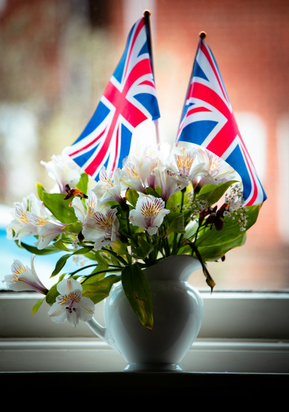 a vase of flowers on a plant