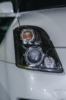 a close up of a car's headlight