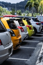 a group of cars parked in a parking lot