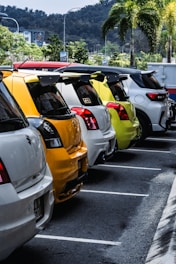 a group of cars parked in a parking lot