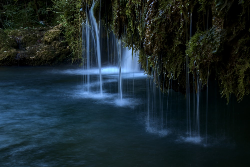 a waterfall in a forest