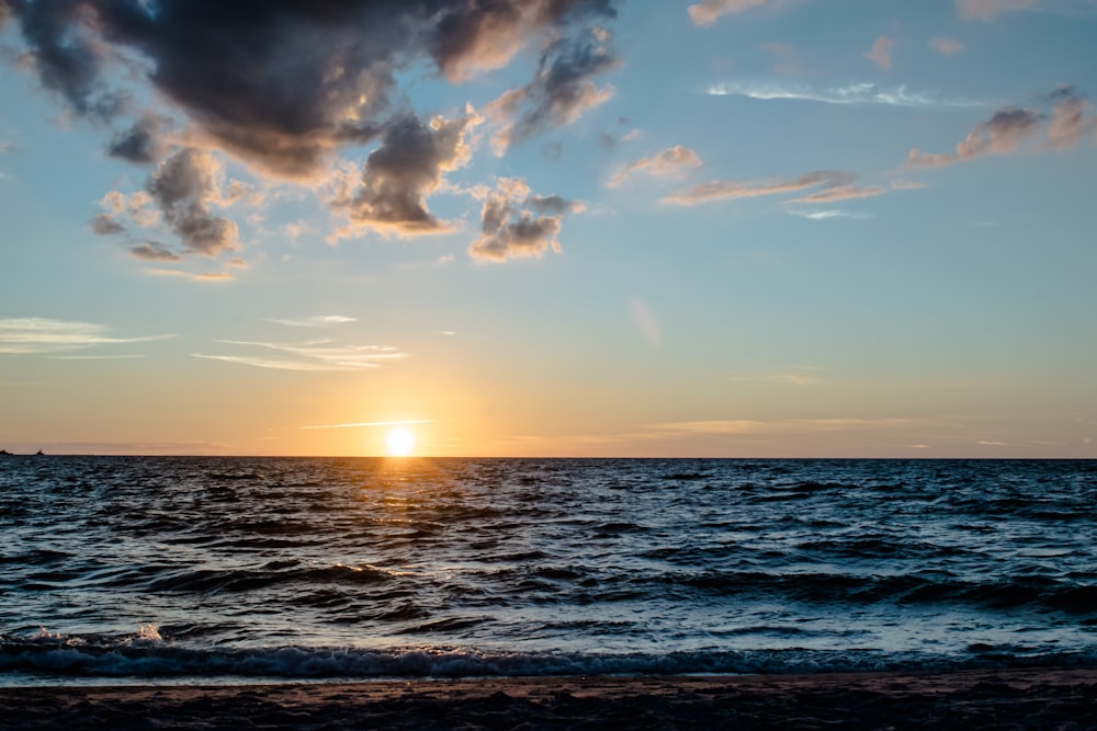 a sunset over the ocean