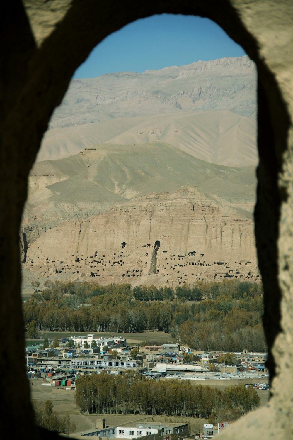 a view of a town and mountains