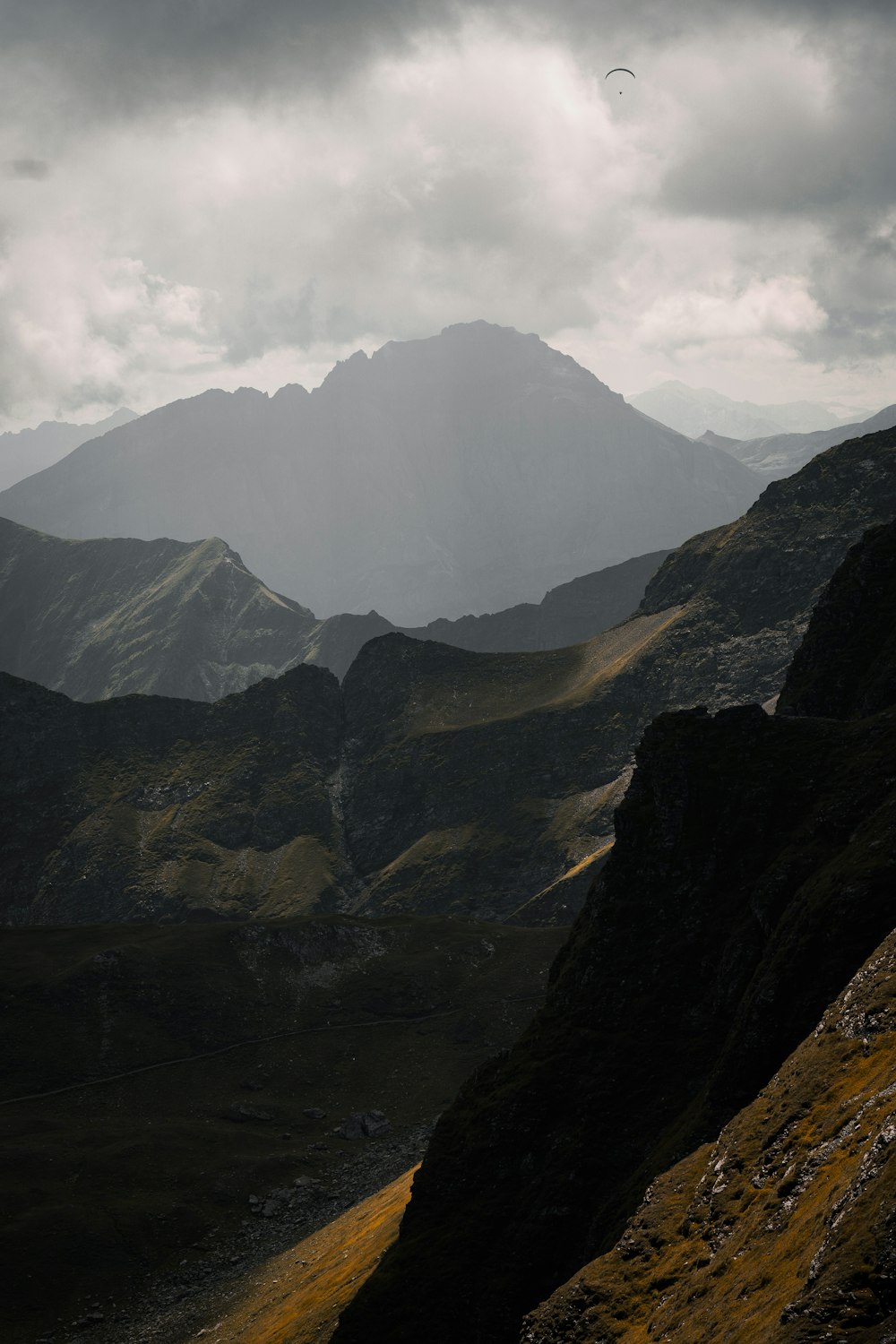 a mountain range with a river running through it