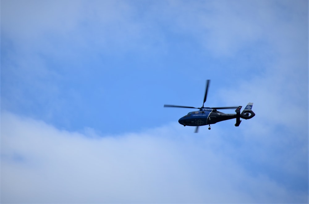 a helicopter flying in the sky