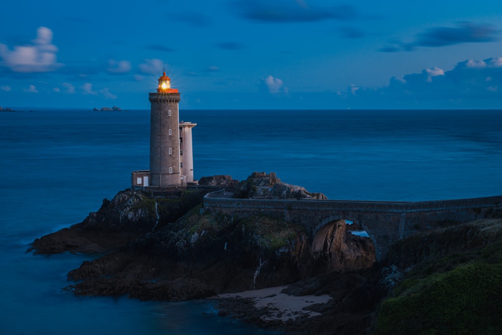 a lighthouse on a rocky cliff