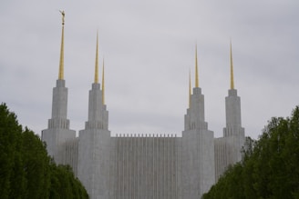 A serene image of a theological seminary campus with students engaged in worship.