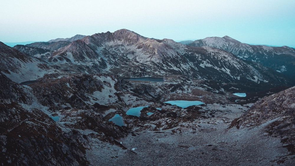a mountain range with a lake