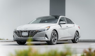 Side profile of a silver sedan with clean lines and polished rims