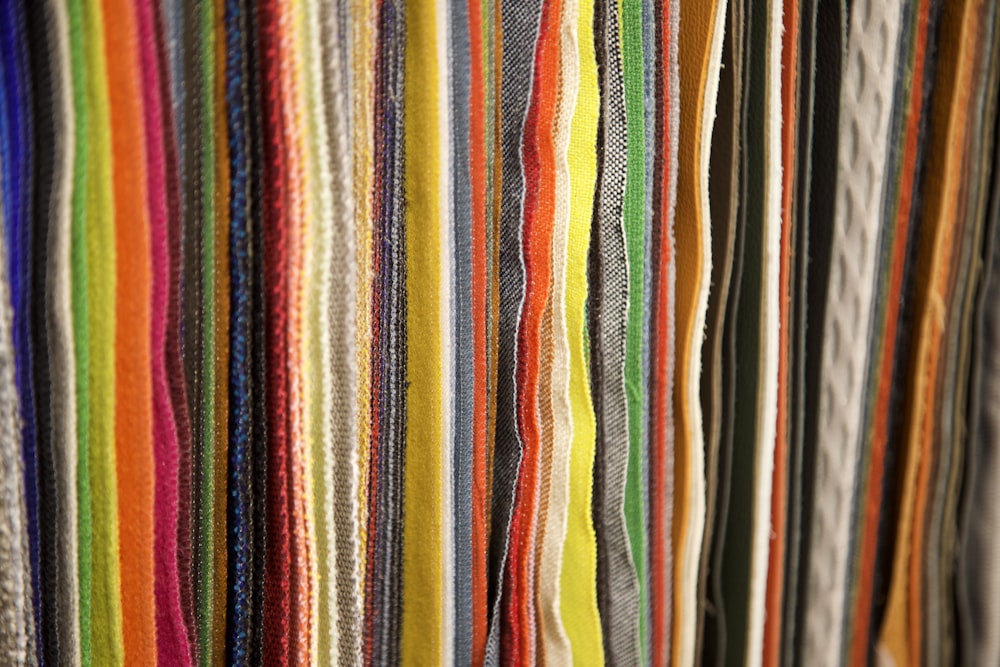 a close up of a bunch of colored pencils