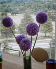 Close-up photo of a vibrant flower vase in the suite's living area.