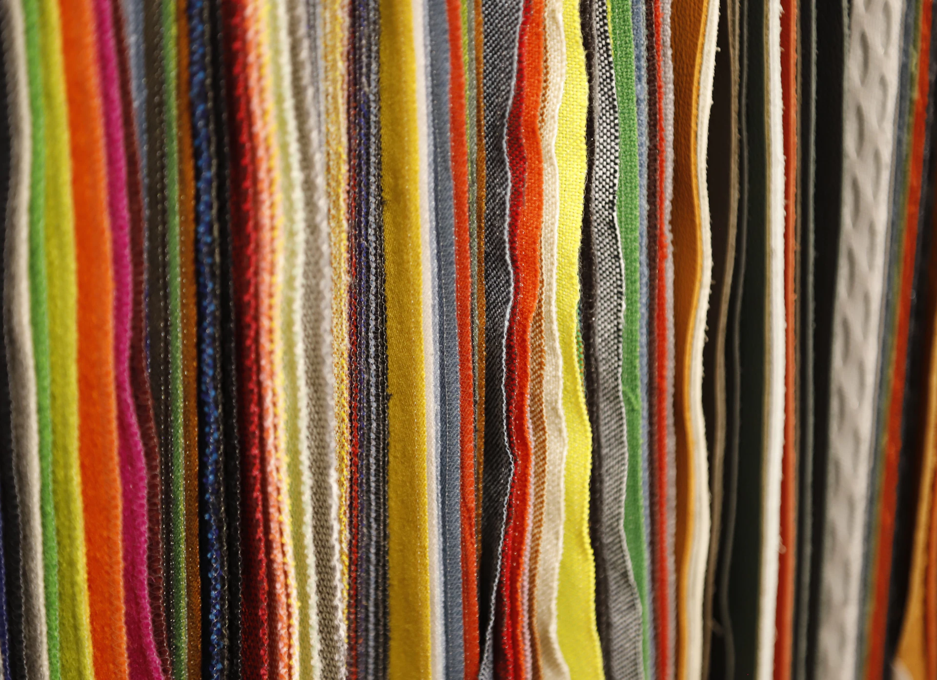 a close up of a bunch of colored pencils