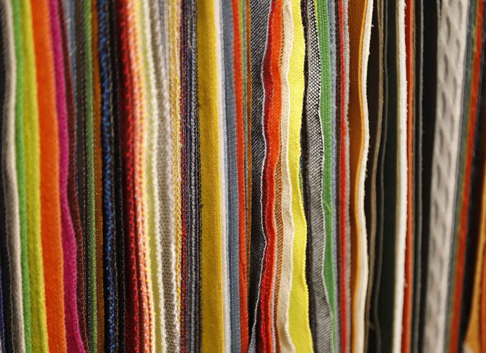 a close up of a bunch of colored pencils