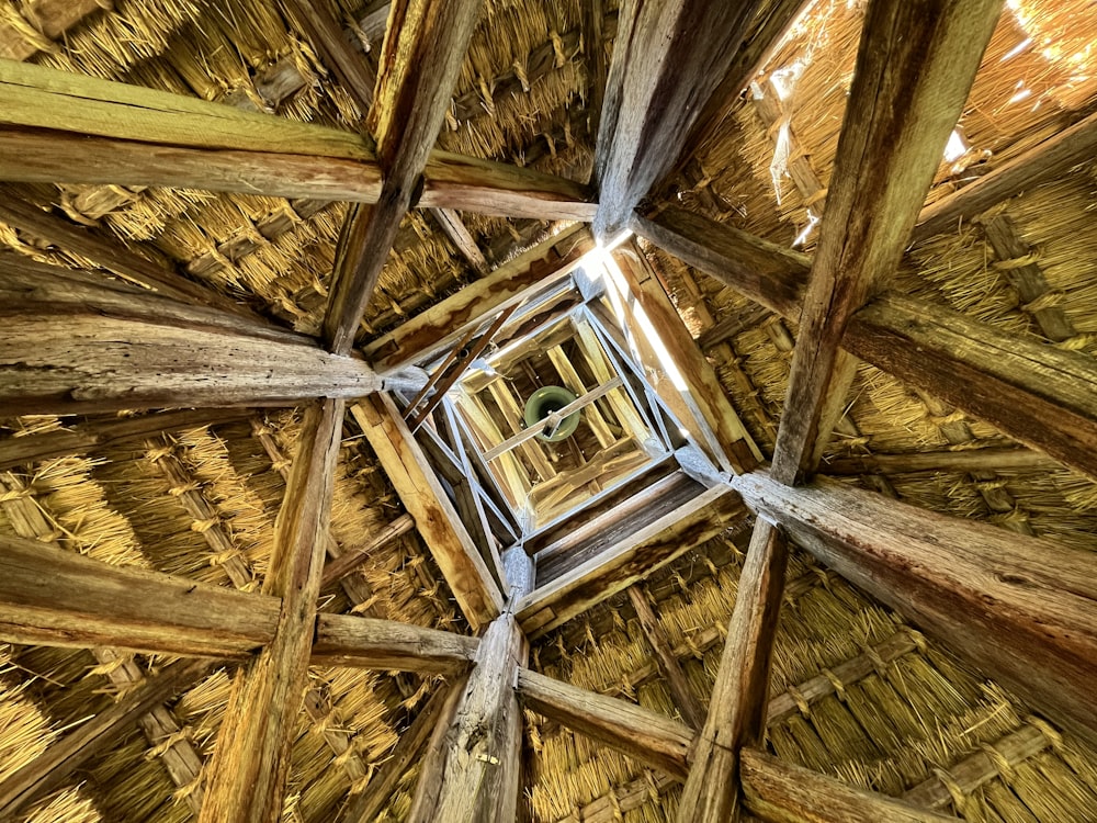 a wooden structure with a wheel