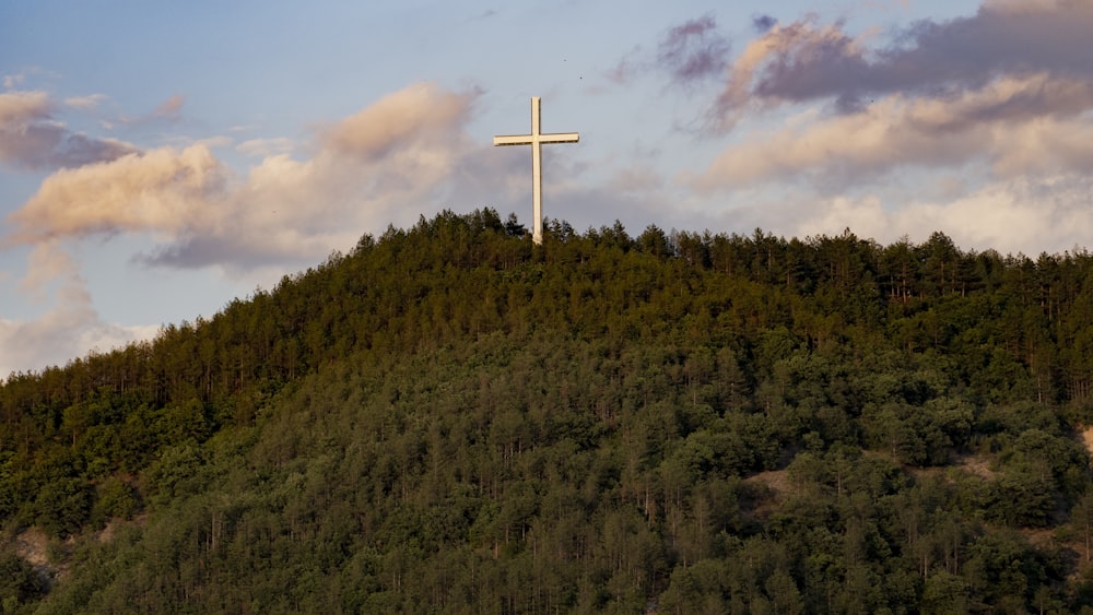 a cross on a hill