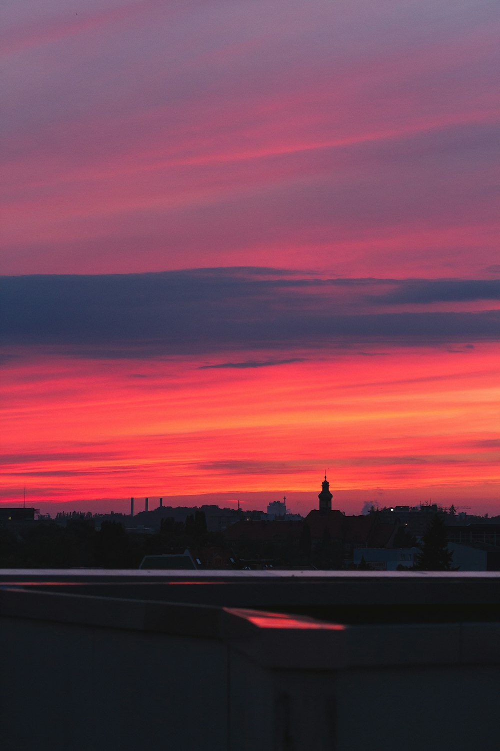 a sunset over a city