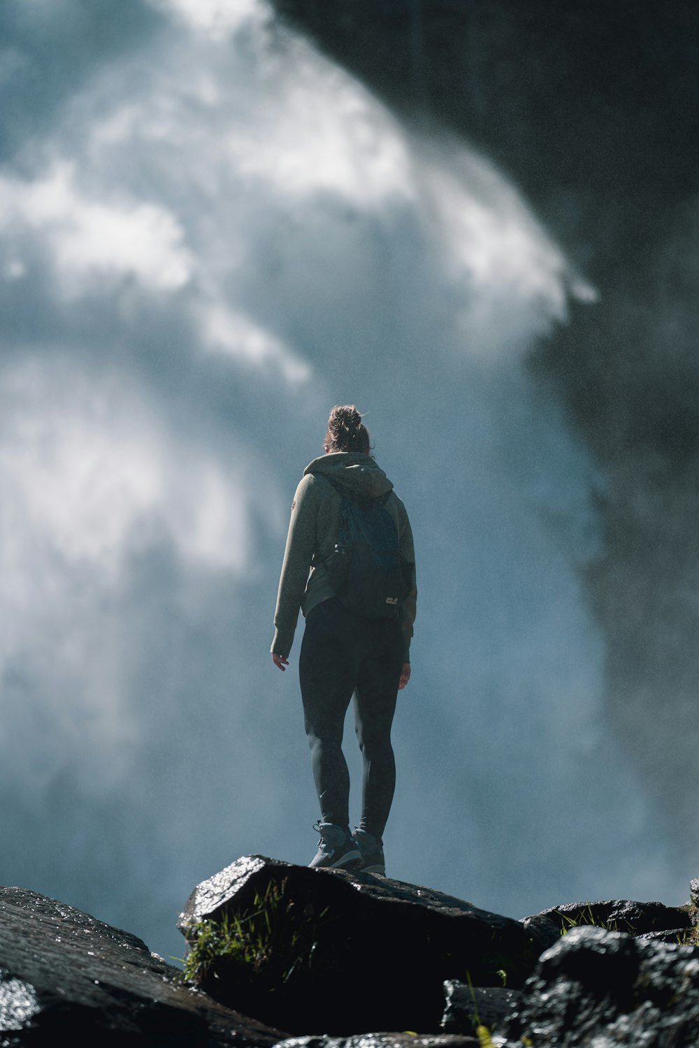 a man standing on a rock