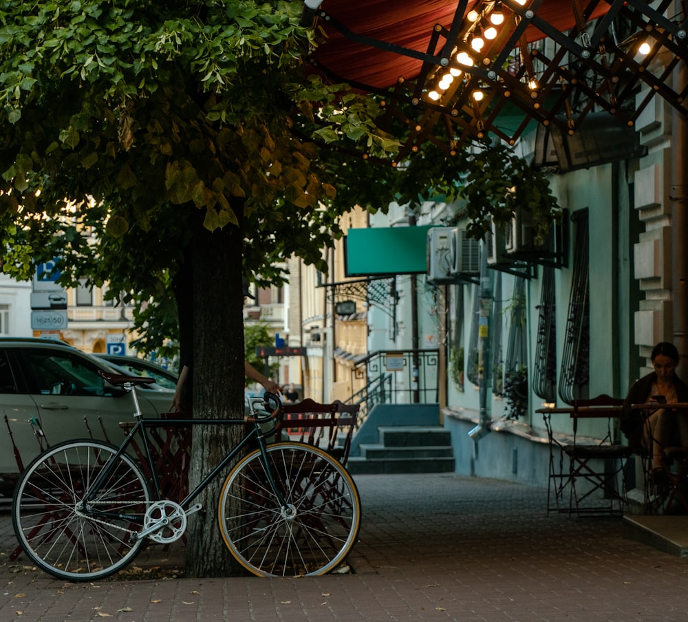 a bicycle parked on the sidewalk