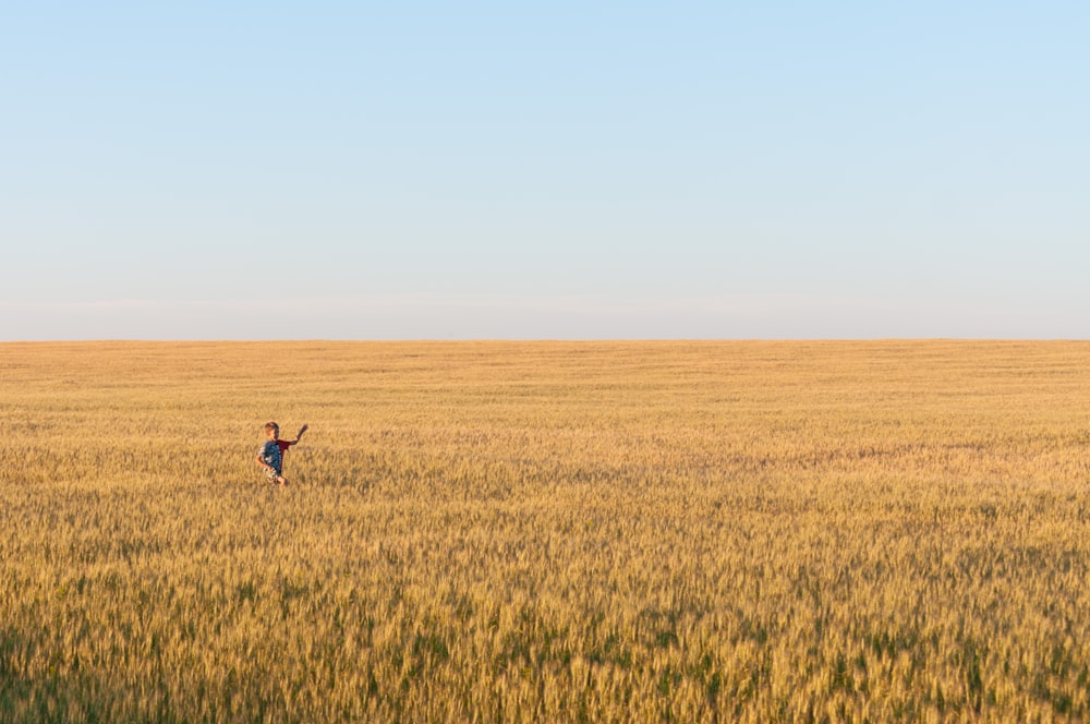 a person running in a field