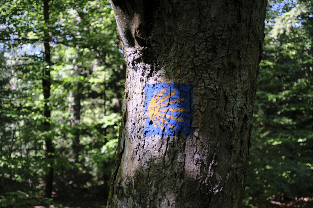 a tree with a painted face