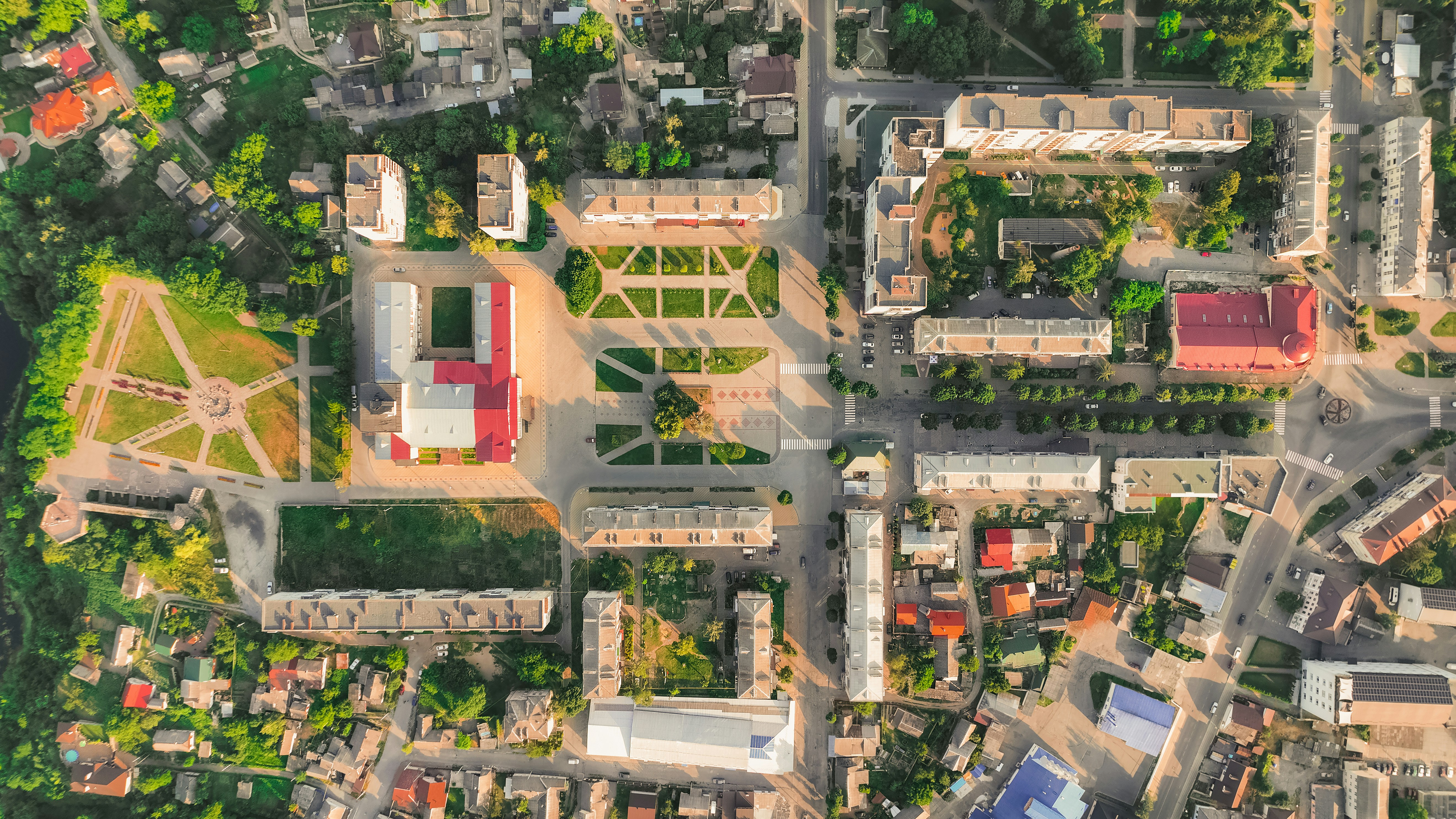 a display in a store, Ukrainian city from drone aerial photography with architecture shapes and figures of buildings and squares, summer color