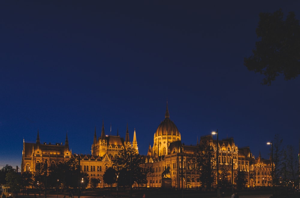 a large building with a dome roof at night