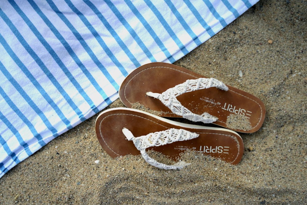 a pair of sandals on a carpet