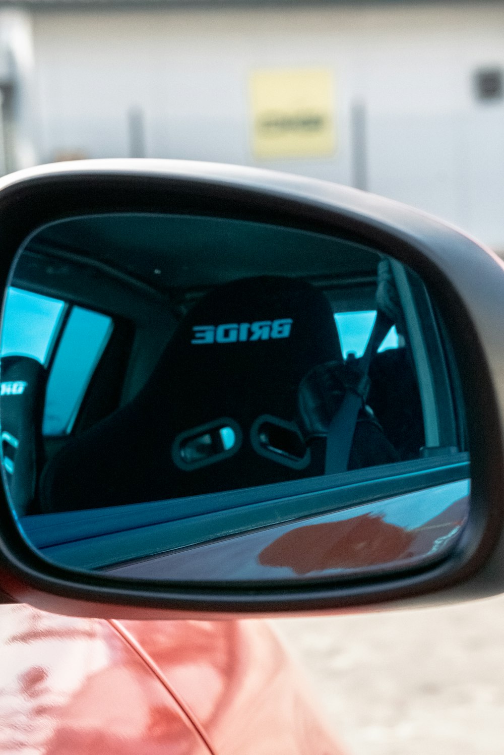 a close up of a car's side mirror