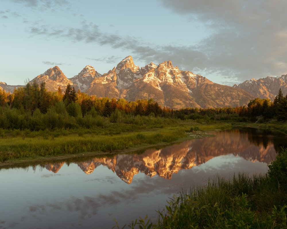 a lake with a mountain in the background