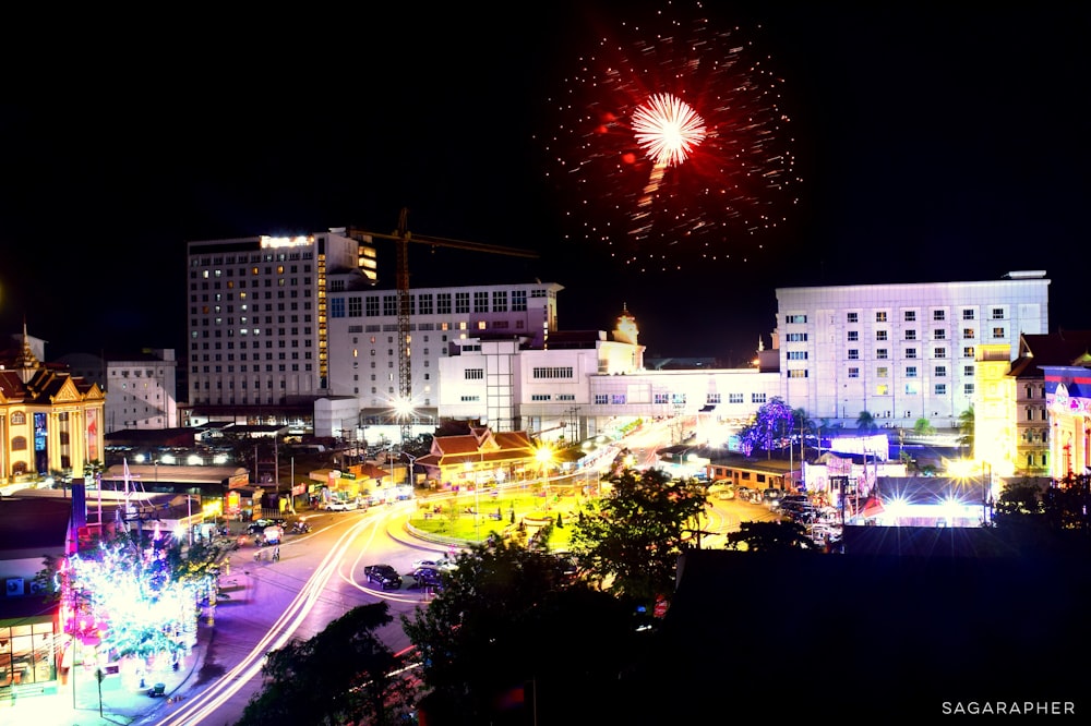 a city with fireworks in the sky