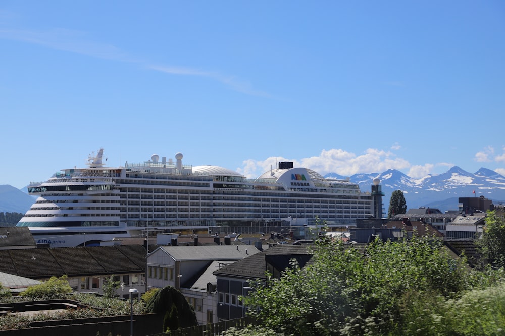 a large cruise ship in a city