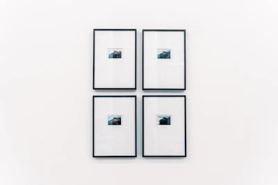 Fine art prints arranged on a minimalist white wall, highlighting southern Chile’s rugged coastlines.