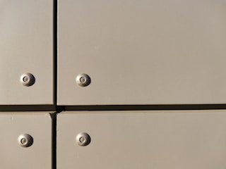 Technician inspecting a panel fastened with pem® standard self-clinching nuts