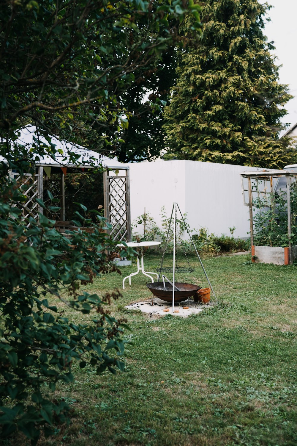 a backyard with a swing set