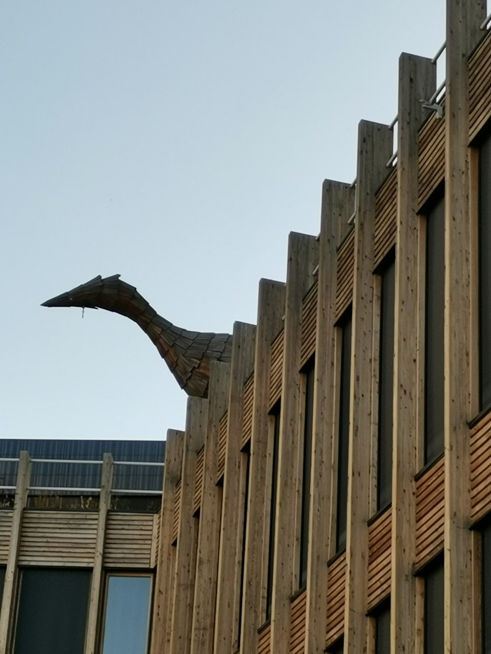 a building with a metal pole