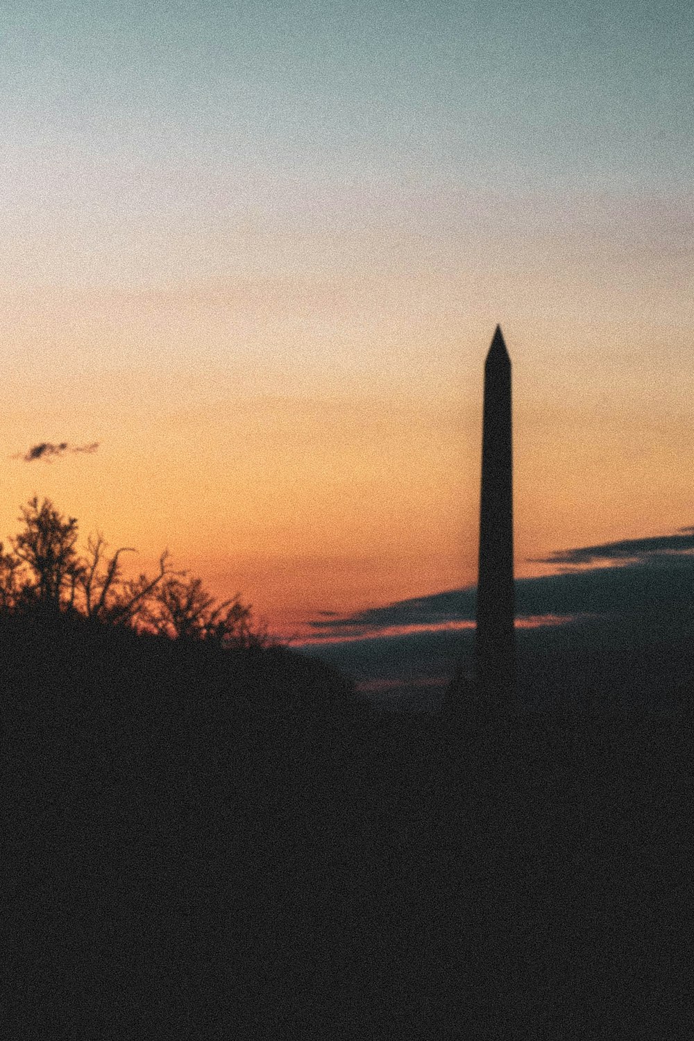 a tall tower in the distance