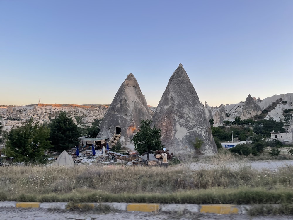 a group of pyramids in a field