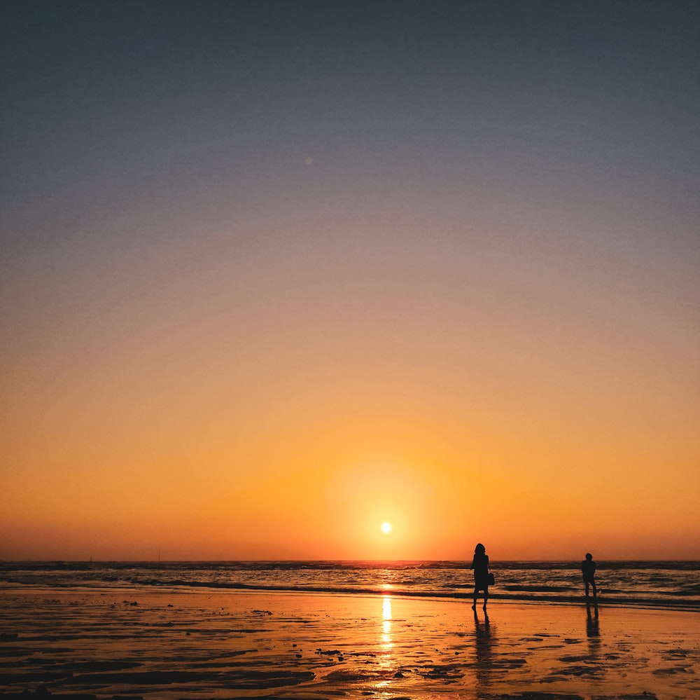 a person standing on a beach