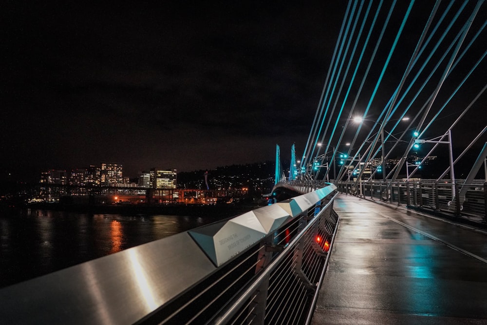 a bridge with lights on at night