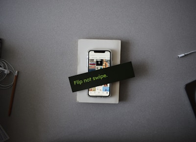 A smartphone screen showing a colorful nano learn feed with short vertical lesson videos and swipe gestures.