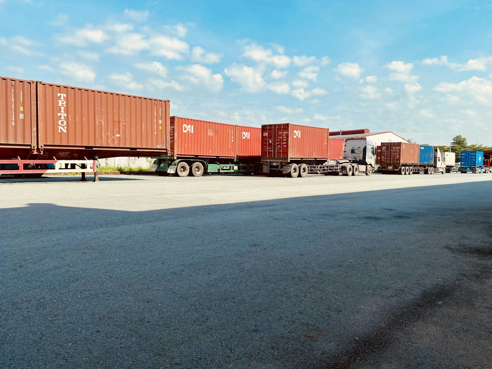 a group of containers on a trailer