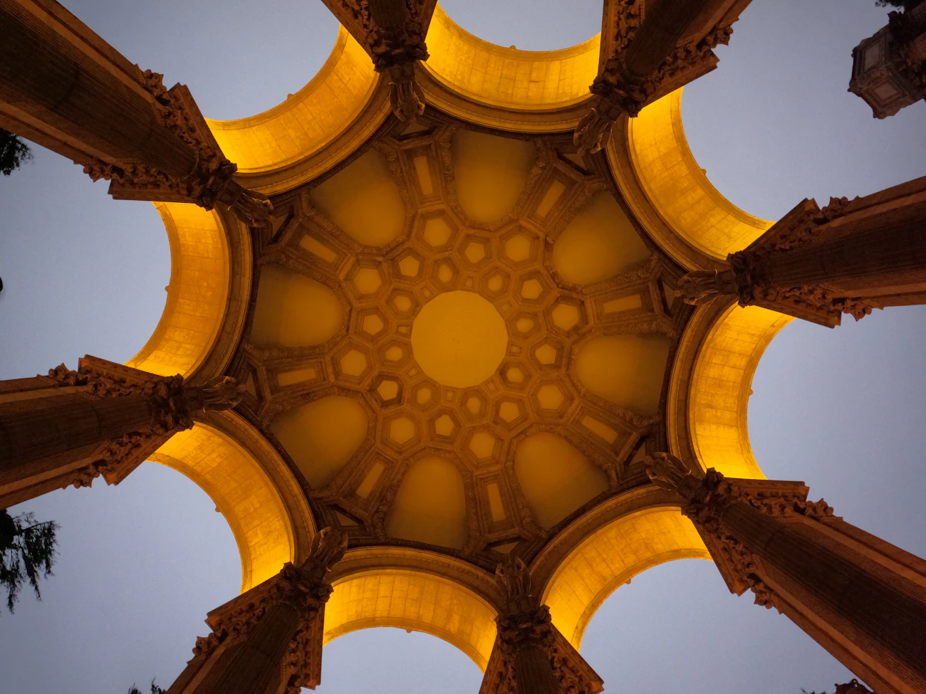 Golden geometric architectural ceiling, viewed from below
